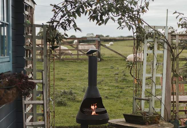 Light the chiminea-style barbecue and cook up a feast! 