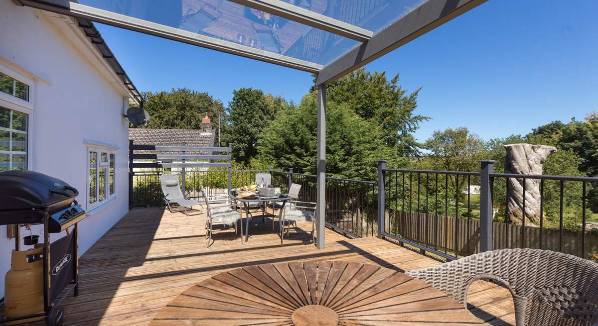 There's plenty of outside space to soak up the Devonshire sunshine and that all important gas barbecue.