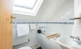 The homely family bathroom makes up the first floor.  Please note the sloping ceilings. - Thumbnail Image