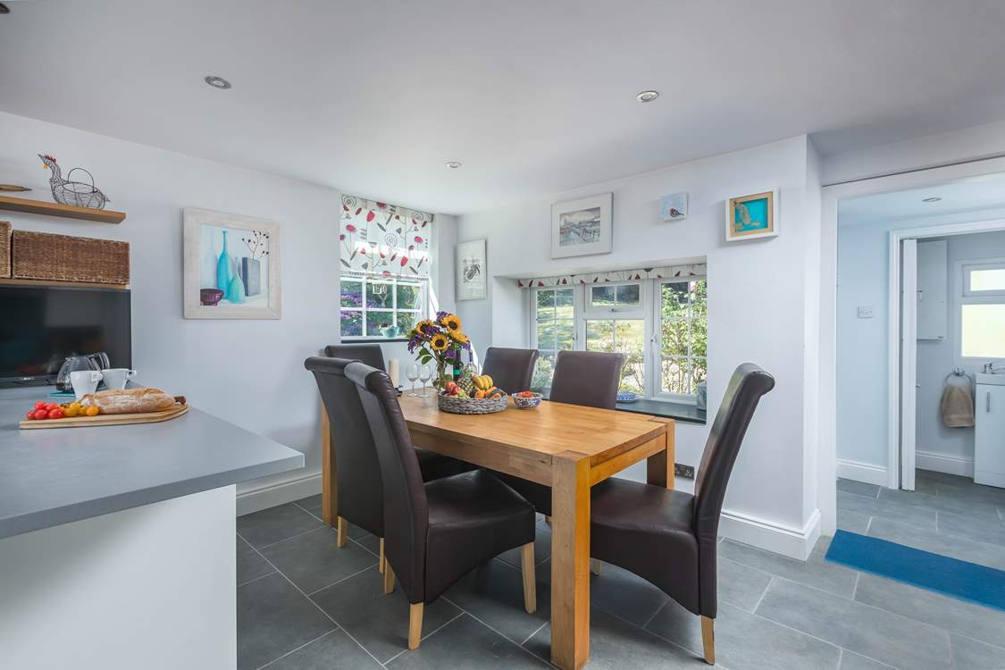 The wooden dining-table is superb for hearty family meals throughout the day.