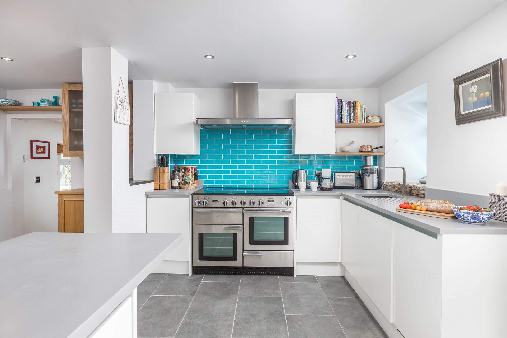 The modern kitchen has everything you'll need on your stay.