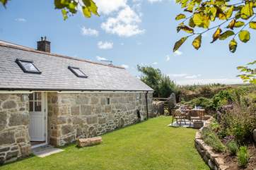 Sit and enjoy sun-drenched days in the gorgeous garden.