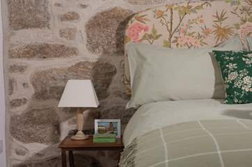 Pretty linens and a comfy bed await.