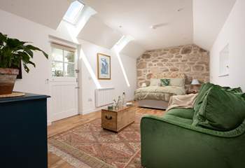 Perfect for lovebirds, the cosy living/sleeping space at Stargazey Barn.  