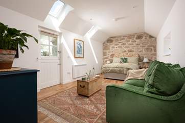 Perfect for lovebirds, the cosy living/sleeping space at Stargazey Barn.