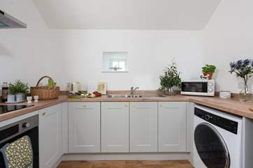 The gorgeous separate kitchen has all you need.