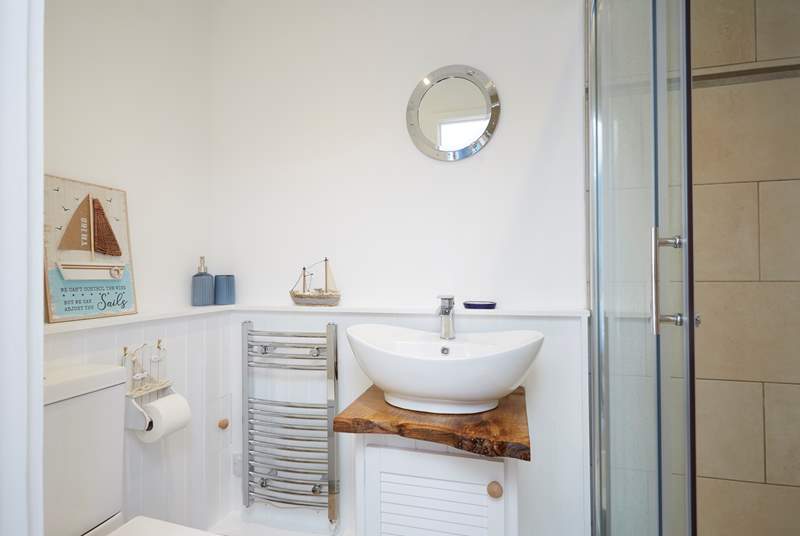 The en suite shower-room to bedroom 1, perfect for a refreshing shower after a busy beach day.