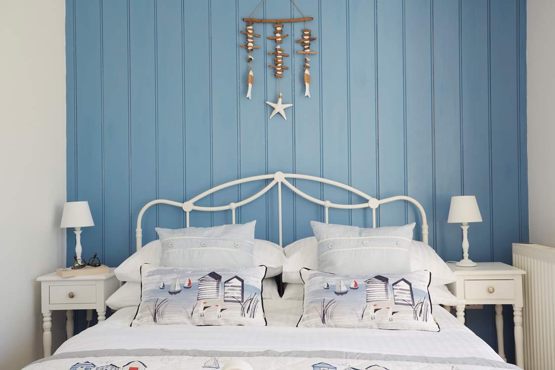 Sweet dreams in this nautically themed bedroom.