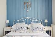 Sweet dreams in this nautically themed bedroom.