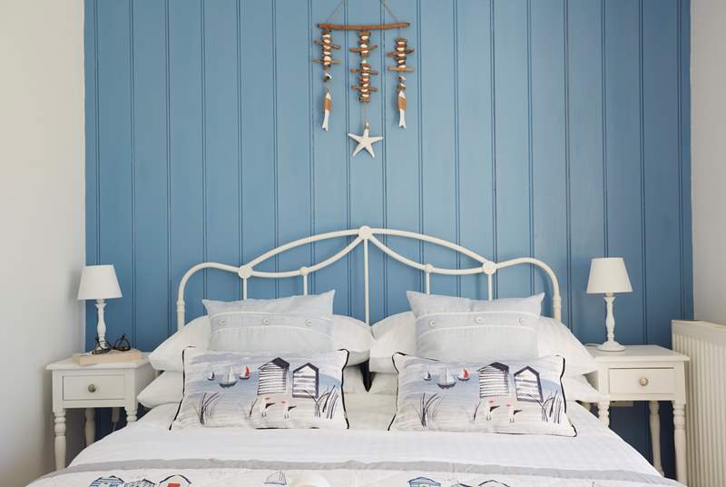 Sweet dreams in this nautically themed bedroom.