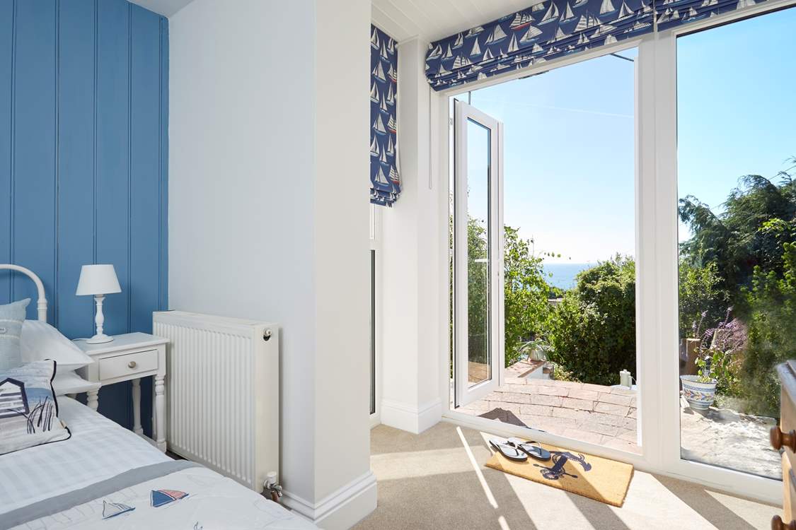 The lower ground floor double bedroom has a gorgeous outlook. Please be mindful of the unfenced area in front.