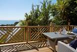 Sit on the upper deck located above the house and enjoy island living at its best.