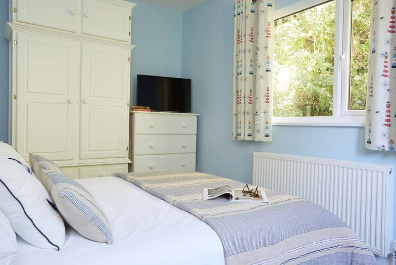 Bedroom 3 on the ground floor has a king-size double bed and Smart TV.