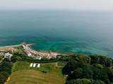 Aerial view of the cricket ground and Steephill Cove to the front of Sheldonia.
