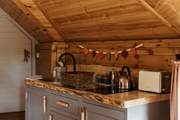The kitchen is well-equipped for your stay in nature.