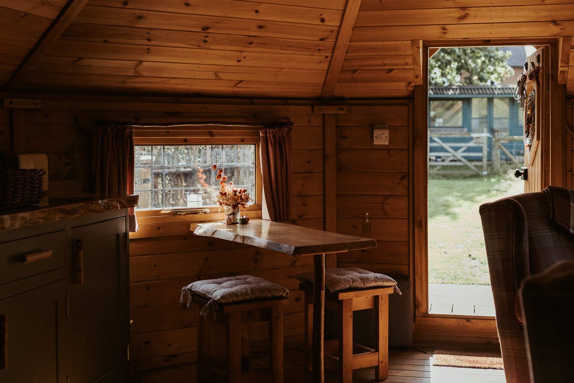 Take a seat at the dining table or...