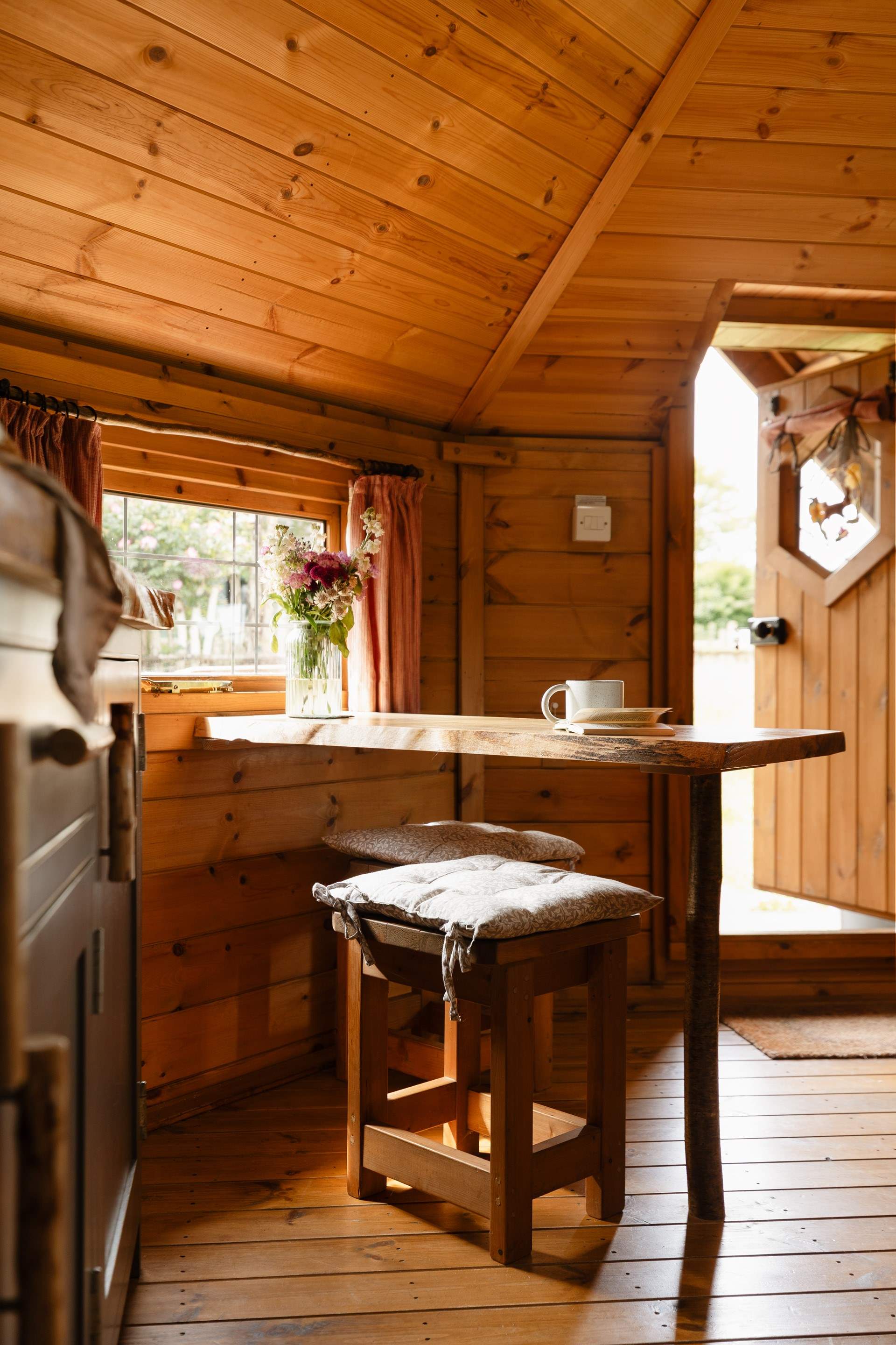 Take a seat at the dining table or...