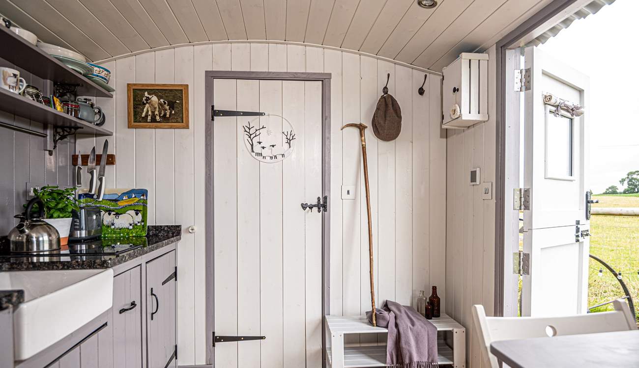 The en suite shower-room is to the right of the hut. 