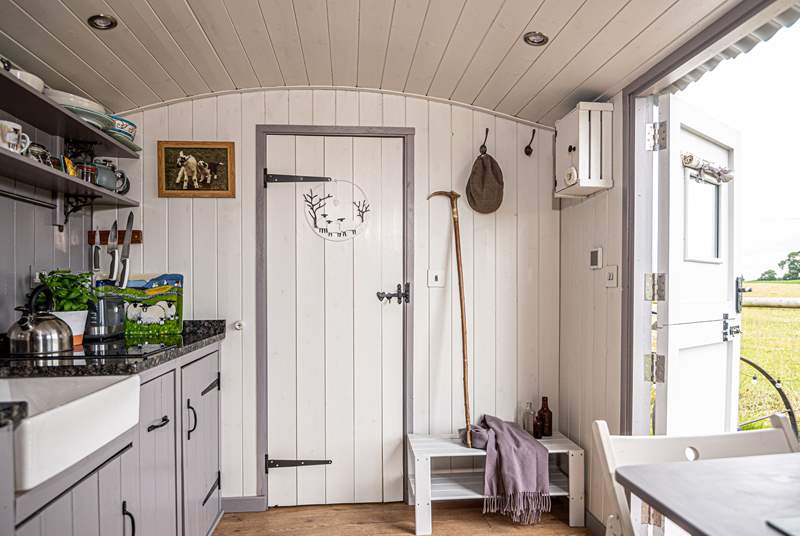 The en suite shower-room is to the right of the hut. 