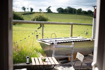 Sink into the steamy wood-fired hot tub and admire the rolling hills of the Staffordshire countryside.