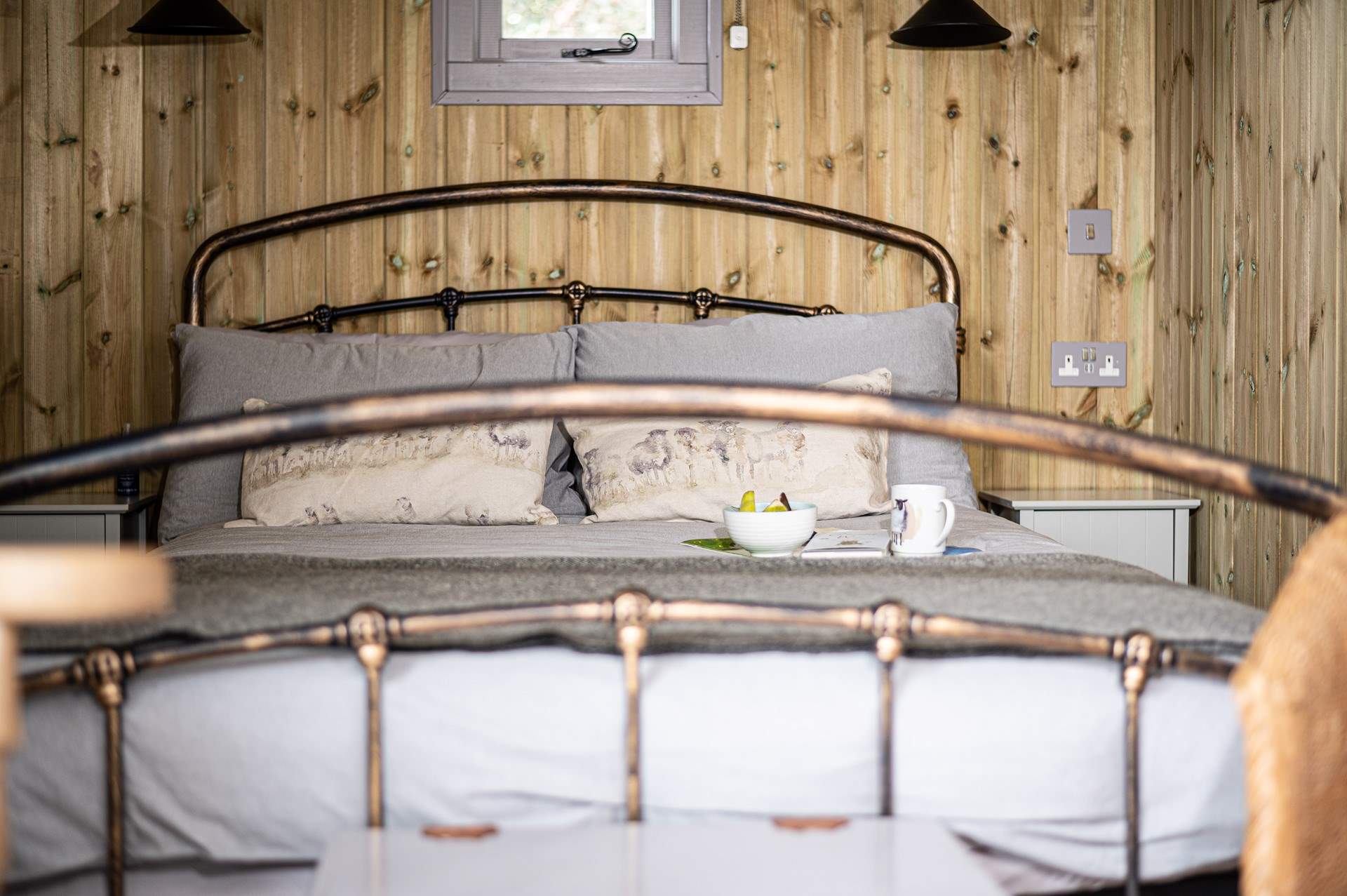 The comfy double bed is the perfect place to savour slow mornings.