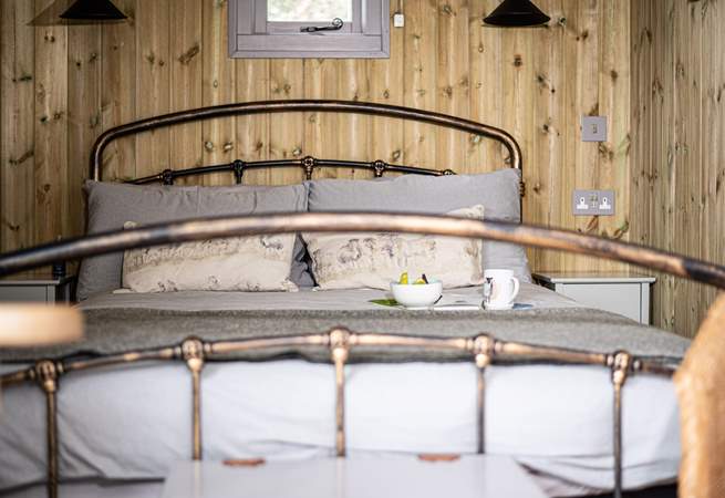 The comfy double bed is the perfect place to savour slow mornings.