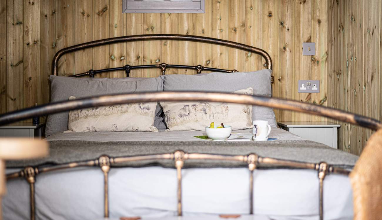 The comfy double bed is the perfect place to savour slow mornings.