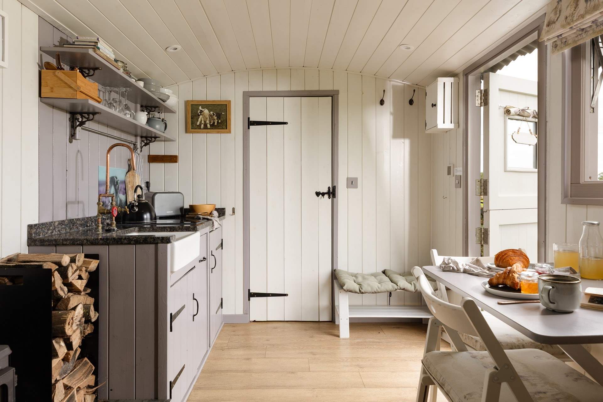 You'll find the sleek shower-room just beyond the kitchen.