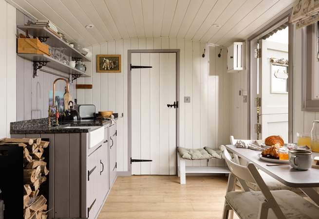 You'll find the sleek shower-room just beyond the kitchen.