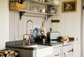 The well-equipped kitchen is complete with everything you'd need for your stay.