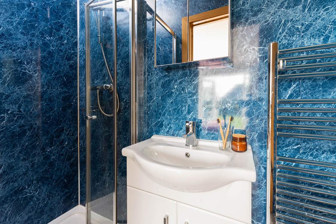 Bedroom 1 has an en suite shower-room.