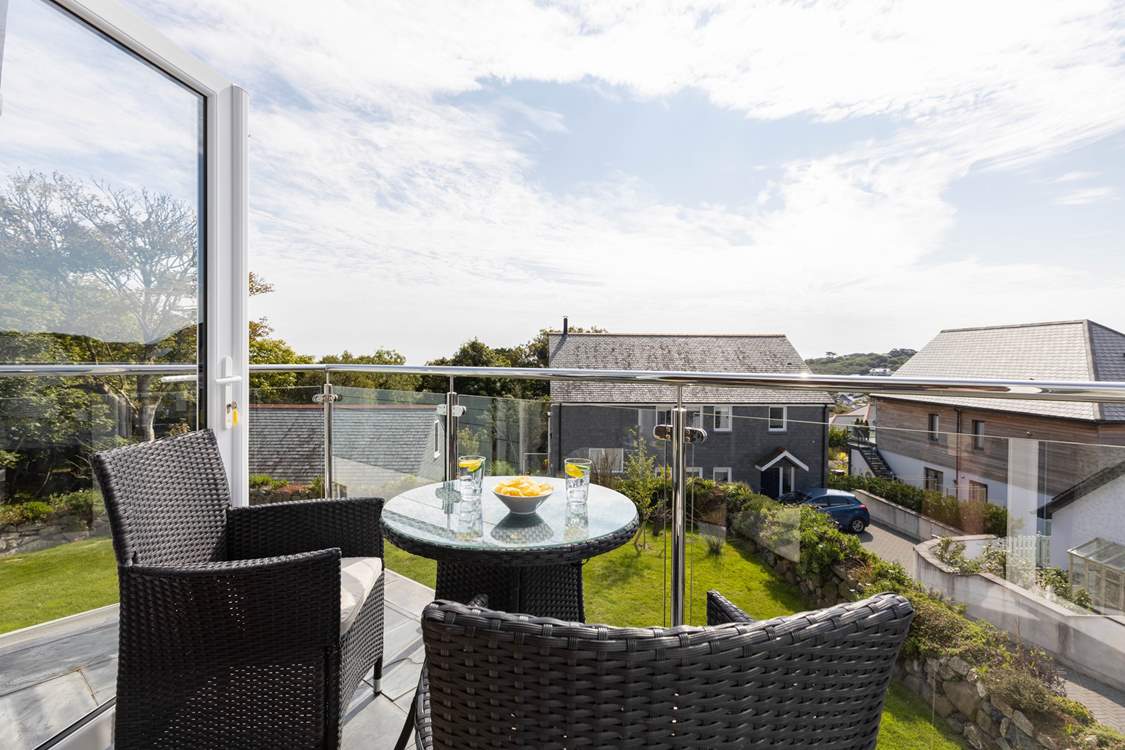 The sunny balcony is a lovely place to relax.