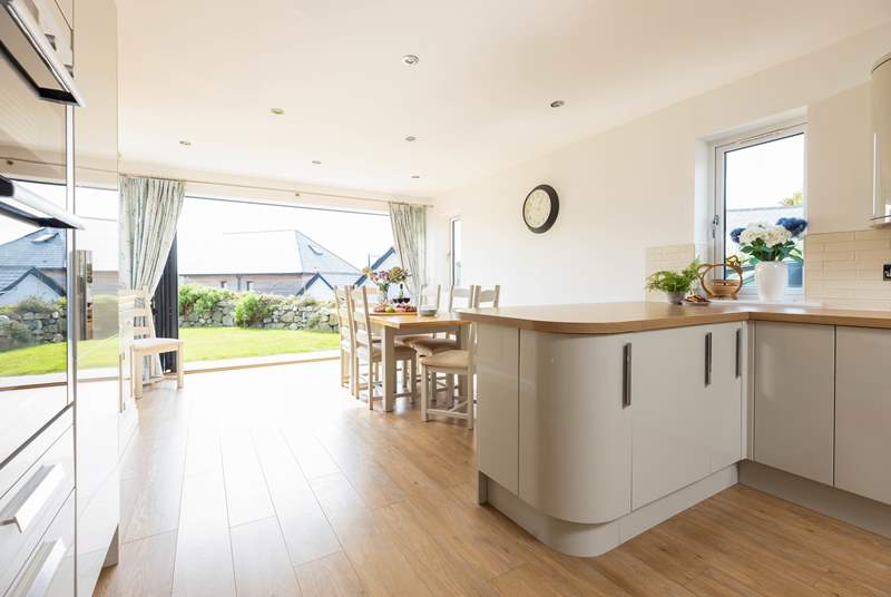 The open plan kitchen and dining space - ideal for sociable suppers!