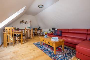 The comfortable and homely living/dining area. You can stretch out on this super comfy sofa bed.
