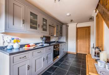 The fully fitted kitchen has everything to hand to create that special meal.