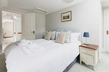 The charming main bedroom.