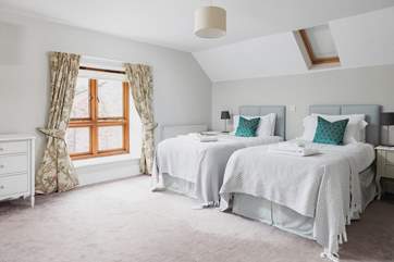 The pretty twin bedroom.