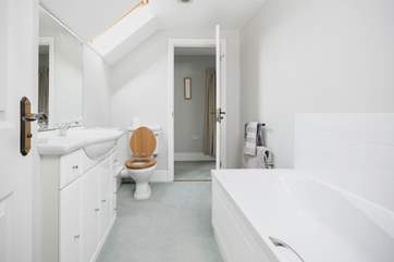 The bathroom upstairs can be accessed from the master bedroom and the landing.