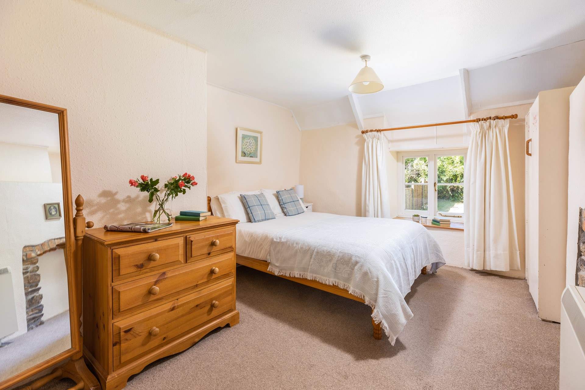 Upstairs you will find the tranquil bedroom. 