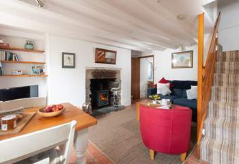 The steep stairs lead to the bedroom. 