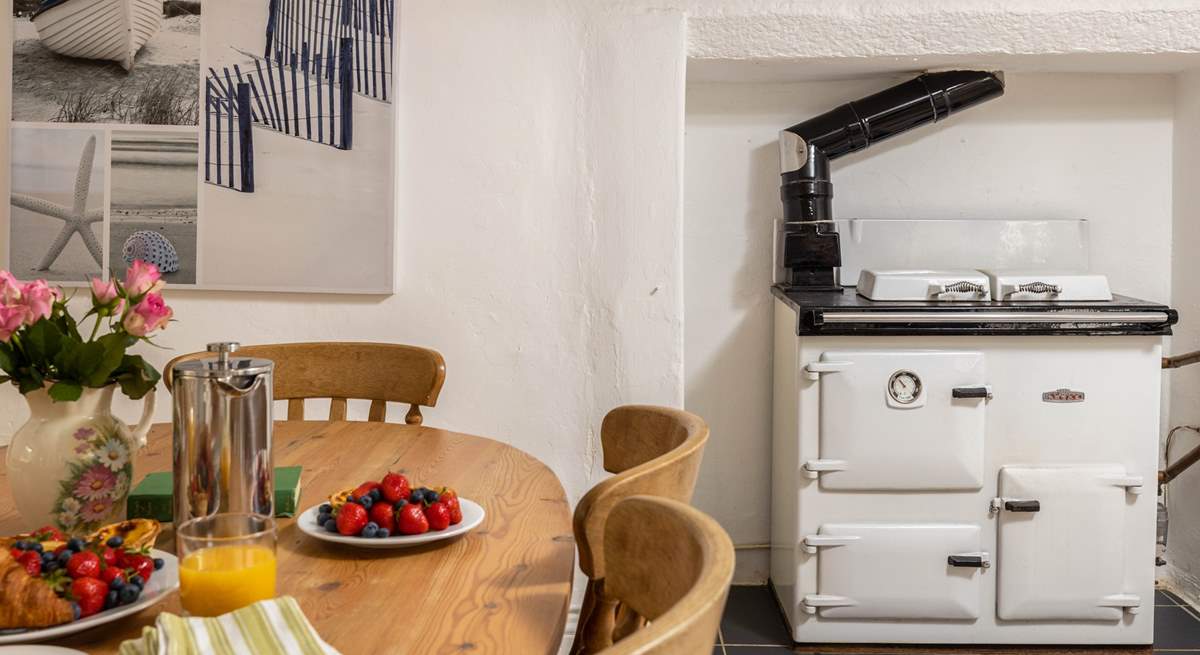 The oil-fired Rayburn adds warmth to this lovely cottage. 