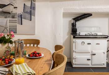 The oil-fired Rayburn adds warmth to this lovely cottage. 