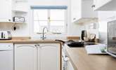 The kitchen has all the equipment you'll need including the all-important dishwasher. - Thumbnail Image