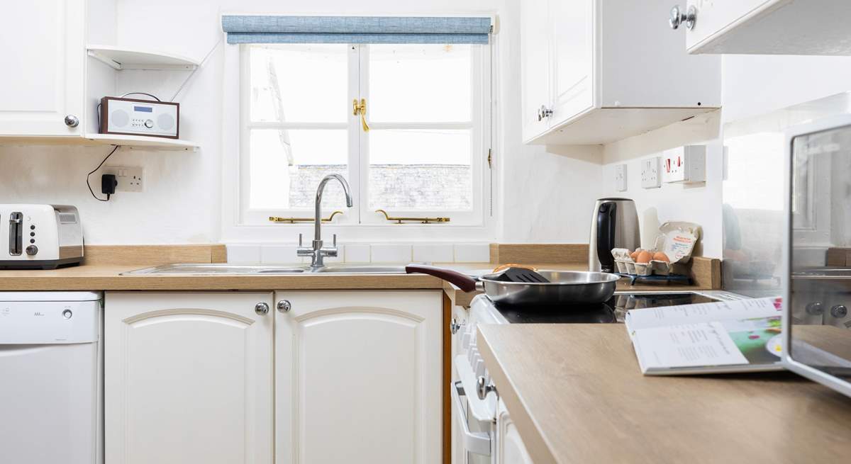 The kitchen has all the equipment you'll need including the all-important dishwasher.