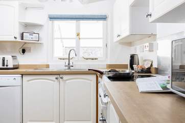 The kitchen has all the equipment you'll need including the all-important dishwasher.