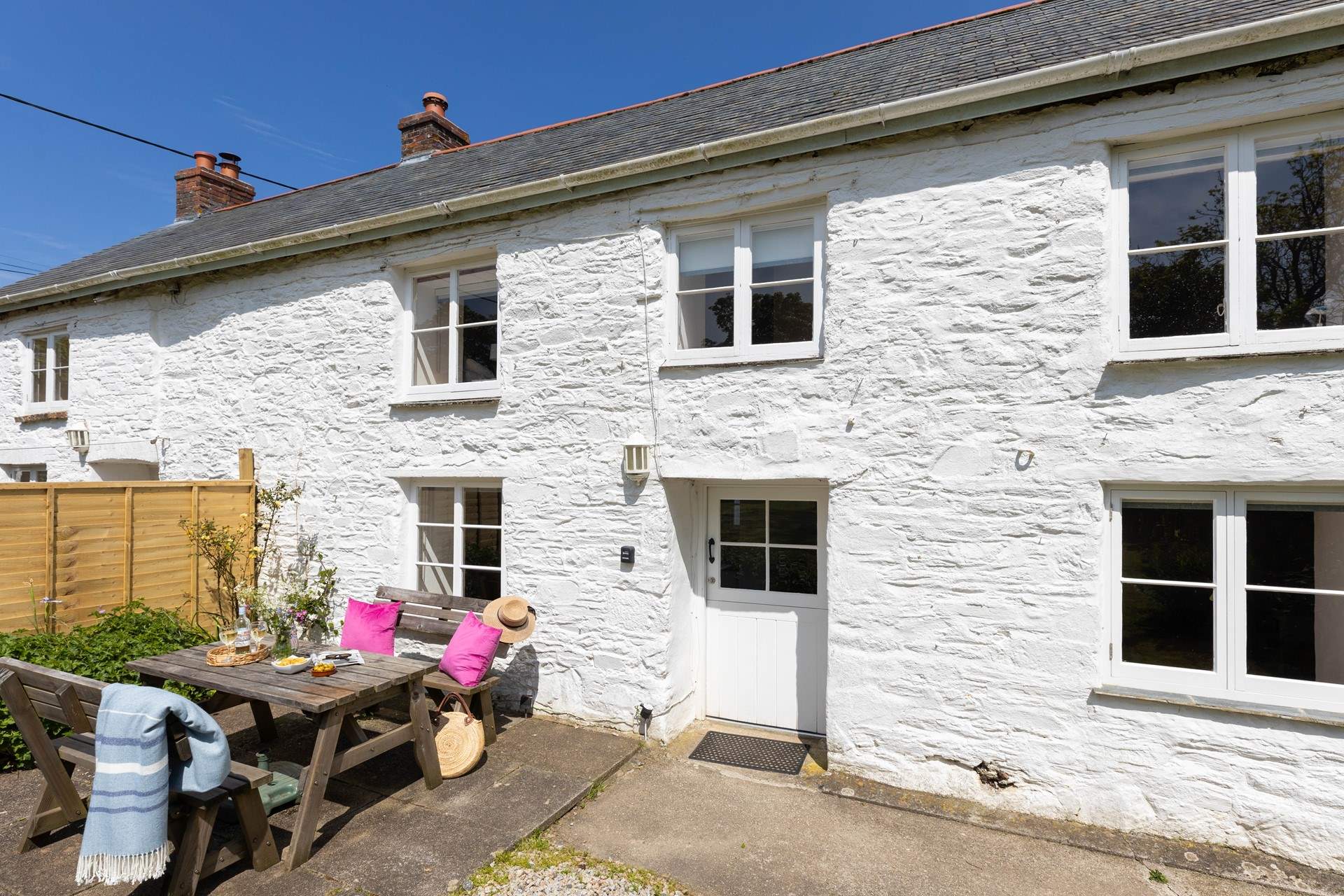 Enjoy long sunny lunches at the cottage. 