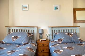 Fabulous linens adorn the bed