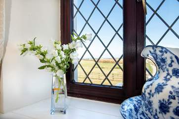 Bedroom one enjoys wonderful views across the fields and out to sea