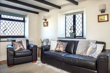 Snuggle up in the sitting-room and relax with a good book