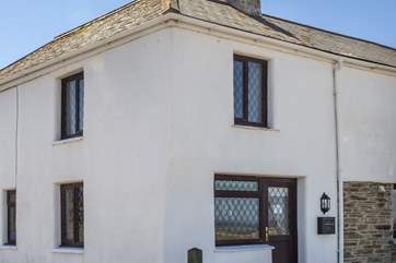 Smugglers Cottage sits at the end of a small terrace of traditional cottages